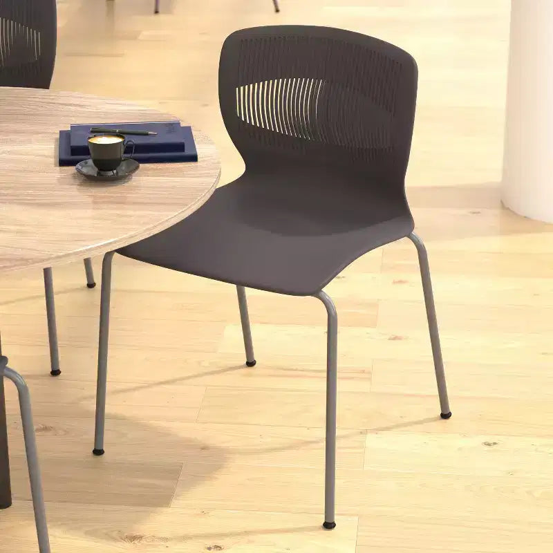 Emma and Oliver Heavy Duty 770 lb. Capacity Ergonomic Polypropylene Stack Chair with Lumbar Support and Steel Frame