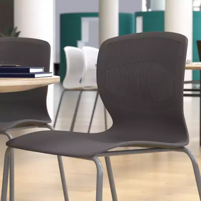 Emma and Oliver Heavy Duty 770 lb. Capacity Ergonomic Polypropylene Stack Chair with Lumbar Support and Steel Frame