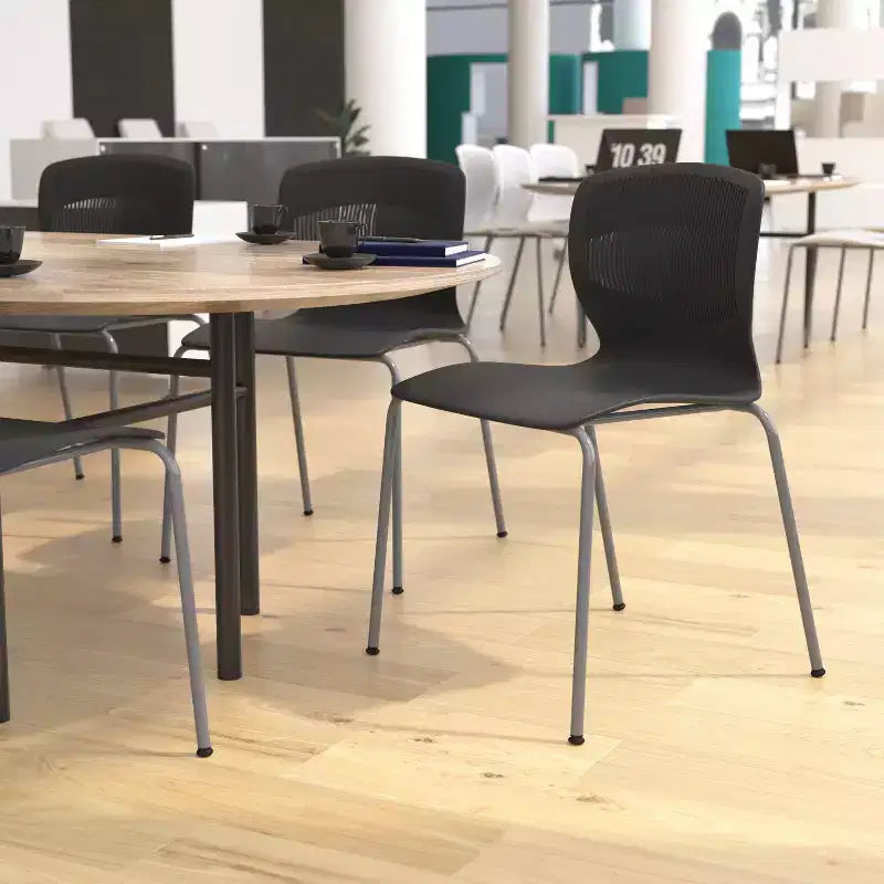 Emma and Oliver Heavy Duty 770 lb. Capacity Ergonomic Polypropylene Stack Chair with Lumbar Support and Steel Frame