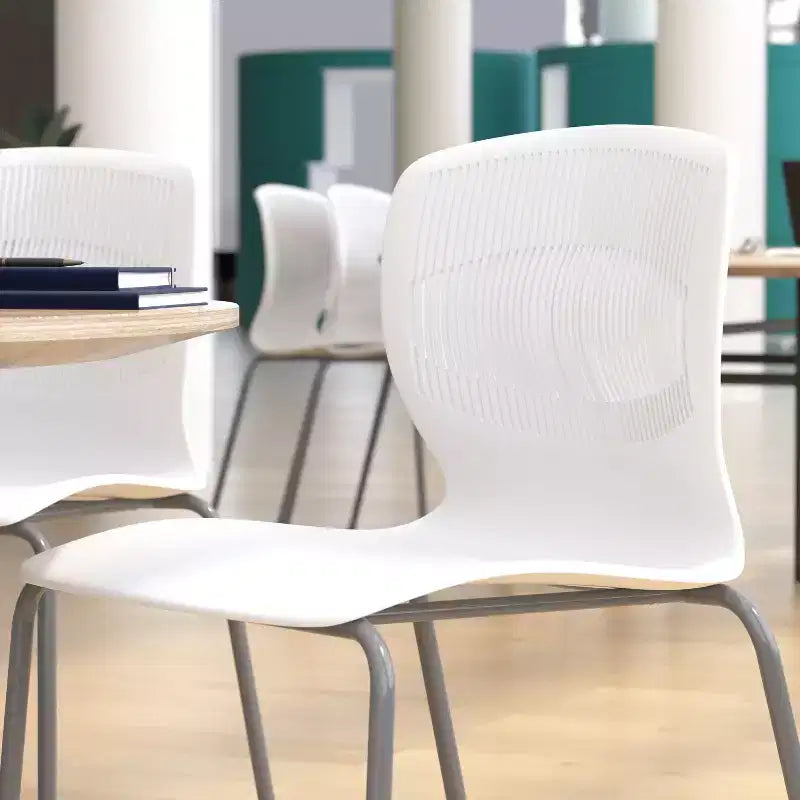 Emma and Oliver Heavy Duty 770 lb. Capacity Ergonomic Polypropylene Stack Chair with Lumbar Support and Steel Frame