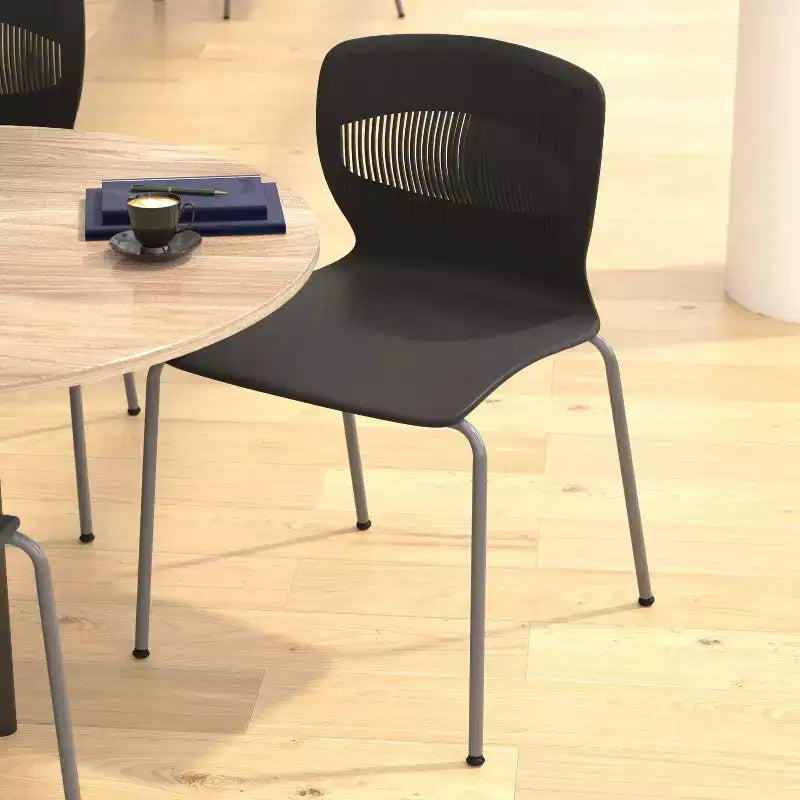 Emma and Oliver Heavy Duty 770 lb. Capacity Ergonomic Polypropylene Stack Chair with Lumbar Support and Steel Frame