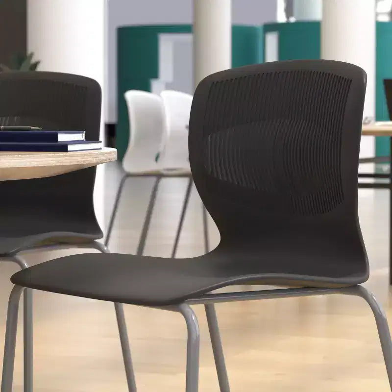 Emma and Oliver Heavy Duty 770 lb. Capacity Ergonomic Polypropylene Stack Chair with Lumbar Support and Steel Frame